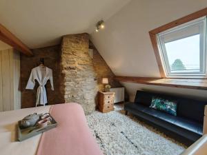 Posezení v ubytování Wishbone Cottage In The Cotswolds