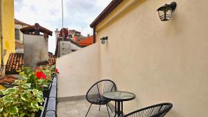 Rõdu või terrass majutusasutuses Hotel Guerrini