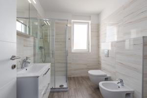 Koupelna v ubytování Apartment The View by SeeAdria Agency + 21 fotografií