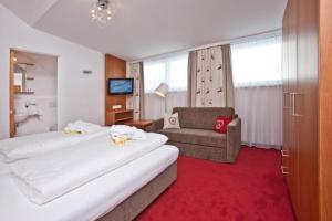 Voodi või voodid majutusasutuse Hotel Plattenhof toas