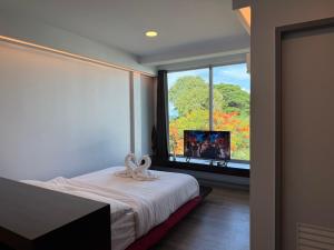 Voodi või voodid majutusasutuse P168 Hostel Samui toas