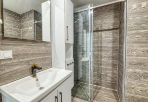 Koupelna v ubytování Grisverde Suites Hotel
