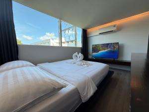 Voodi või voodid majutusasutuse P168 Hostel Samui toas +37 fotot