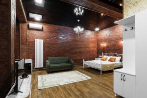 a bedroom with a bed and a couch in a room at Roots Resort in Kobuleti +119 photos