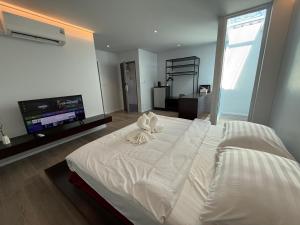 Voodi või voodid majutusasutuse P168 Hostel Samui toas