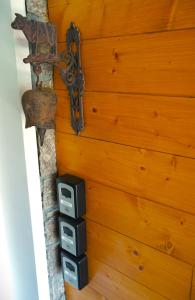 a room with a wall with a wooden wall at Gite MontBlanc in Verrens-Arvey