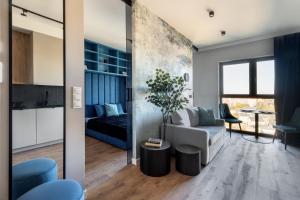 Istumisnurk majutusasutuses Apartamenty Tespis - Góreckiego 19 next to STREFA KULTURY - SPODEK, NOSPR, MCK