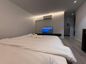 Voodi või voodid majutusasutuse P168 Hostel Samui toas