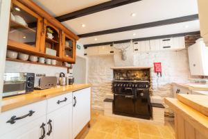 Køkken eller tekøkken på Pinfold Cottage, Dog Friendly Yorkshire Coast & Countryside + 22 billeder