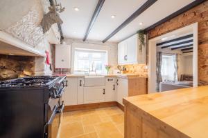 Køkken eller tekøkken på Pinfold Cottage, Dog Friendly Yorkshire Coast & Countryside