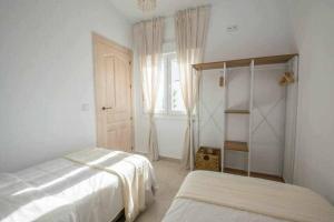 Posteľ alebo postele v izbe v ubytovaní Casa Marinero beach 3