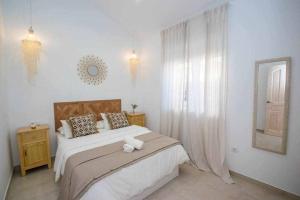 Posteľ alebo postele v izbe v ubytovaní Casa Marinero beach 3