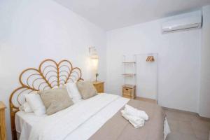 Łóżko lub łóżka w pokoju w obiekcie Casa Marinero beach 1