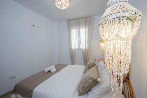 Łóżko lub łóżka w pokoju w obiekcie Casa Marinero beach 1
