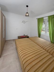Postel nebo postele na pokoji v ubytování Ceres Apartments