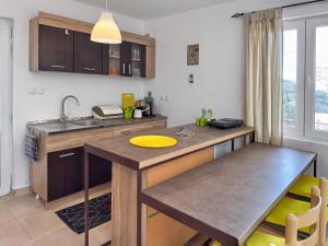 Kuchyň nebo kuchyňský kout v ubytování Ceres Apartments