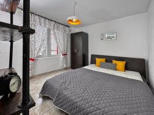 Postel nebo postele na pokoji v ubytování Ceres Apartments