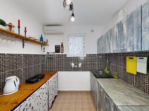 Kuchyň nebo kuchyňský kout v ubytování Ceres Apartments