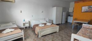 Letto o letti in una camera di Amaranthos Skiathos View