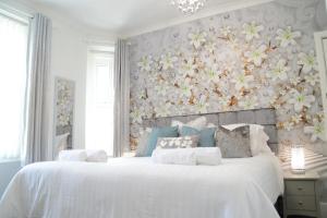Ένα ή περισσότερα κρεβάτια σε δωμάτιο στο St Edmunds Guest House +16 φωτογραφίες