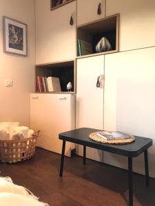 Posezení v ubytování LA MAISON DES BOIS D'OCRE - Gîte Appart Design - Clim Pkg Wifi Jardin à 10mn de Dijon