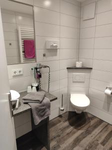 Koupelna v ubytování Hotel Gästehaus Stock Zimmer Brotkörble