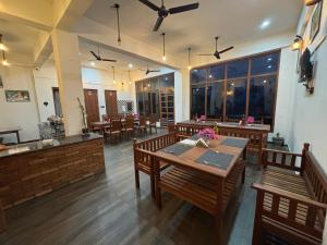 Restoran ili drugo mesto za obedovanje u objektu Lap Of Himalayas Resort