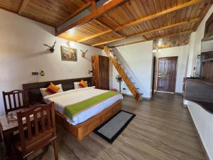 Krevet ili kreveti u jedinici u okviru objekta Lap Of Himalayas Resort