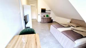 Kuchyň nebo kuchyňský kout v ubytování Moderne Apartments mit Klima, perfekter Anbindung ins Zentrum und kostenlose Parkplätze!