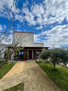 a villa with a view of a house at La Posidonia - Villa Abele in Marsala