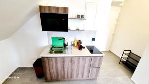 Kuchyň nebo kuchyňský kout v ubytování Moderne Apartments mit Klima, perfekter Anbindung ins Zentrum und kostenlose Parkplätze!