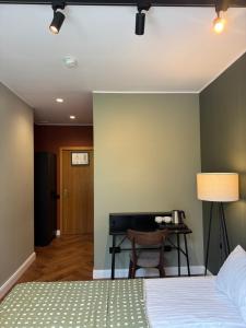 Una cama o camas en una habitación de Avitar