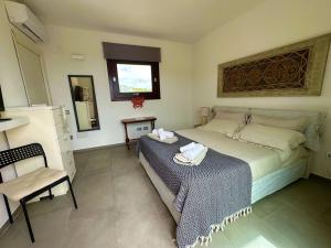 Letto o letti in una camera di Studios con vista
