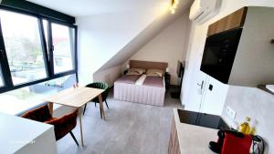 Kuchyň nebo kuchyňský kout v ubytování Moderne Apartments mit Klima, perfekter Anbindung ins Zentrum und kostenlose Parkplätze!