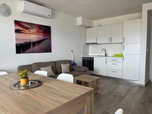 Køkken eller tekøkken på Isola Bella - Apartment B2