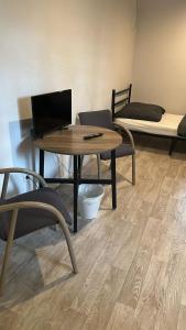 TV a/nebo společenská místnost v ubytování HH Hostels