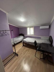 Postel nebo postele na pokoji v ubytování gogoli family hotel