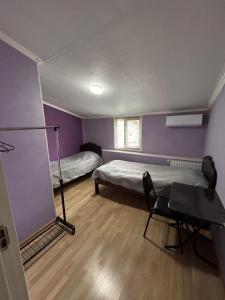 Postel nebo postele na pokoji v ubytování gogoli family hotel