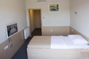 Posteľ alebo postele v izbe v ubytovaní Hotel Lika Jug