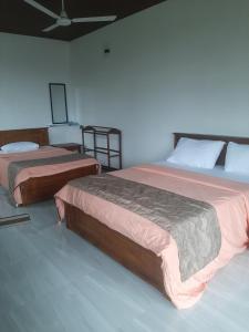 Letto o letti in una camera di Welcome Homestay