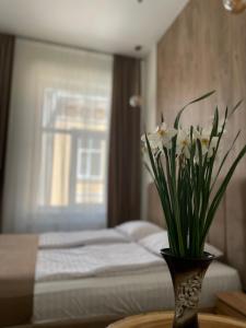 Posteľ alebo postele v izbe v ubytovaní Тиктора, 3 ЦЕНТР