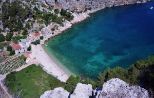 an aerial view of a beach and the ocean at Apartment Maestrol in Zastražišće