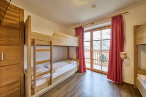 Postel nebo postele na pokoji v ubytování Apartment Residence Top 1