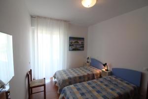 A bed or beds in a room at Apartment Colorado