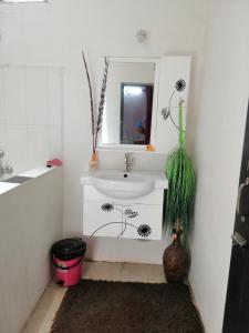 Koupelna v ubytování Ashta Lakshmi Tourist Home Stay