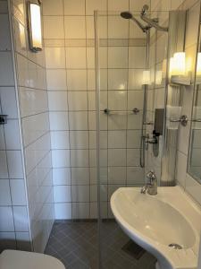 Koupelna v ubytování Hotel Tanum Gestgifveri + 36 fotografií
