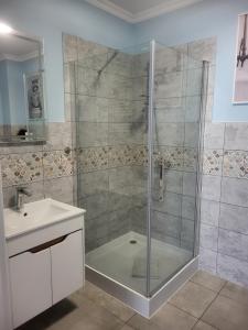 Kúpeľňa v ubytovaní Apartamenty Olimpijska