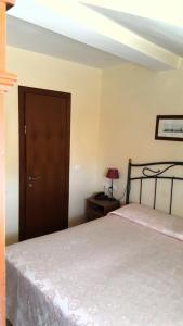 Posteľ alebo postele v izbe v ubytovaní Hotel Locanda Salieri