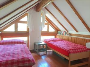 Postel nebo postele na pokoji v ubytování Rustico "Casa di Sasso"