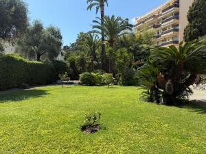 Zahrada ubytování Appartement 3 pièces 5 min plage